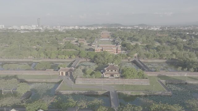 Aerial drone view of Hue Imperial Citadel featuring Ngo Mon Gate, Thai Hoa Palace and Kien Trung Palace, showcasing Vietnam's UNESCO royal heritage, ancient architecture and cultural landmark.