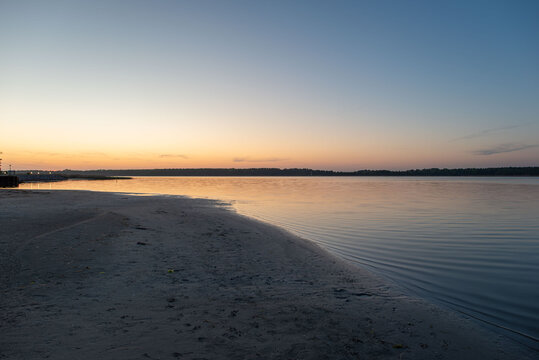 The beach in Barh&ouml;ft is a small swimming area about 60 meters wide, located directly on the Grabow River along the Bodden coast, featuring fine sand and gentle access to the water