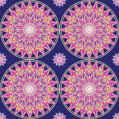 Obraz premium Vibrant floral mandala seamless pattern with neon pink and lime geometric petals on a deep blue background. Perfect for fabric, wallpaper, wrapping paper, textiles, home décor, and digital prints.
