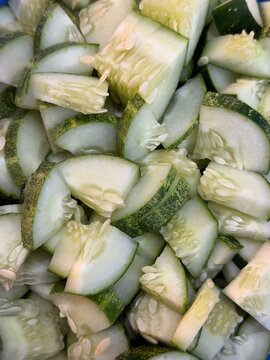 Fresh Chopped Cucumber Slices Texture and Background