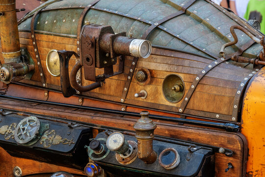 a custom steampunk-themed vehicle sculpture, detailed with numerous metallic steampunk-style gears and components