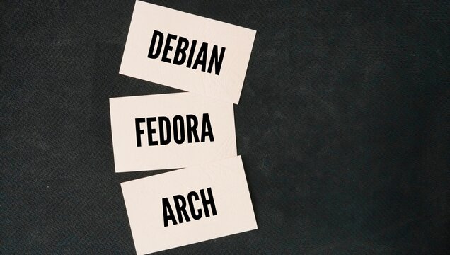 Word Debian, Fedora, and Arch represent the three foundational pillars of the Linux ecosystem, categorized mainly by how they handle software updates and system configuration