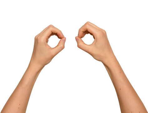 Two hands forming circular shapes like binoculars. Woman s arms raised making round frames near each