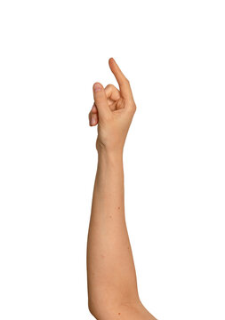 Woman s fingers holding an invisible object mid-air. Right hand raised in a pinching, grasping