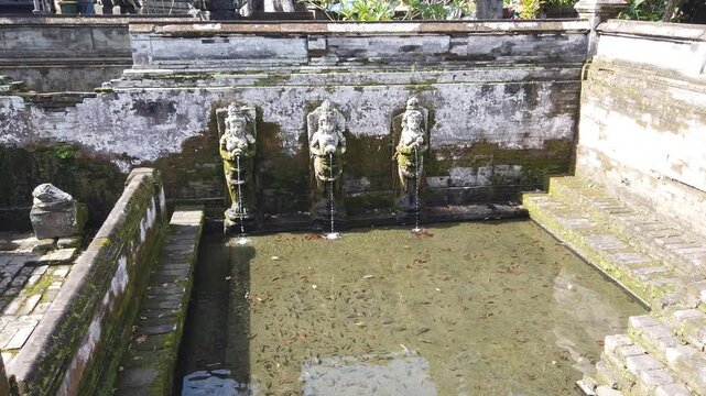 High Angle View of Sacred Fountain Statues at Goa Gajah Temple with Holy Pool in Bali, Indonesia