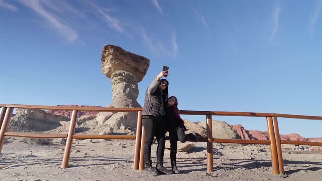 Mother and Daughter Taking Selfie at El Hongo Ischigualasto Provincial Park Argentina Landscape