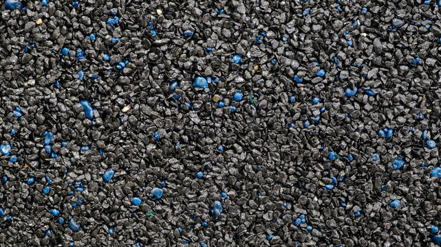 Abstract pebbles background with black and blue snones wall grain grunge  texture for web banner template or wallpaper design