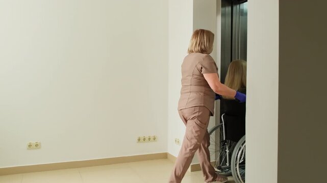 Nurse gently transports patient along spacious hallway. Compassionate doctor escorts woman toward clean and organized hospital room. Slow motion