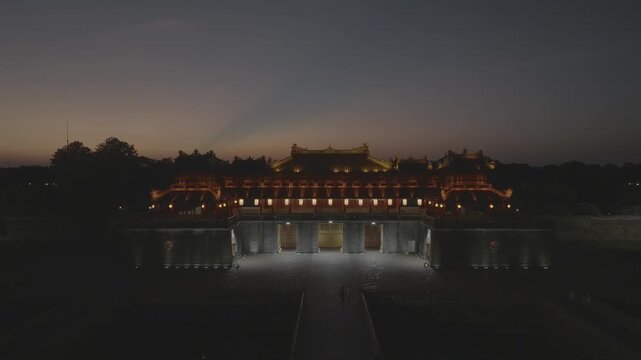 Aerial drone view of Hue Imperial Citadel featuring Ngo Mon Gate and Hue Flag Tower, showcasing Vietnam's UNESCO World Heritage site with majestic royal architecture and historic fortress.