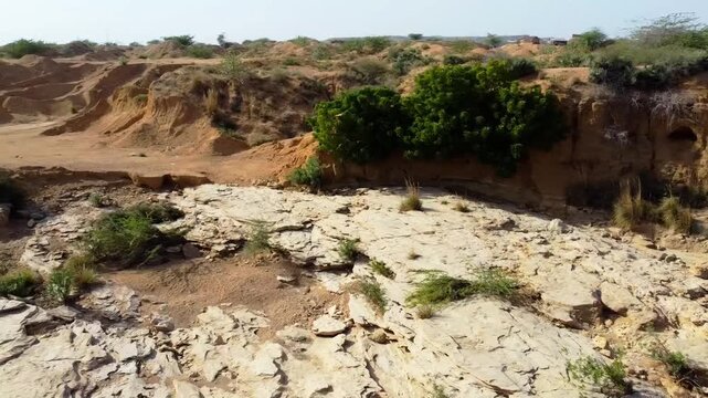 High Angle Drone Footage of Bor Pond Reservoir and sand desert