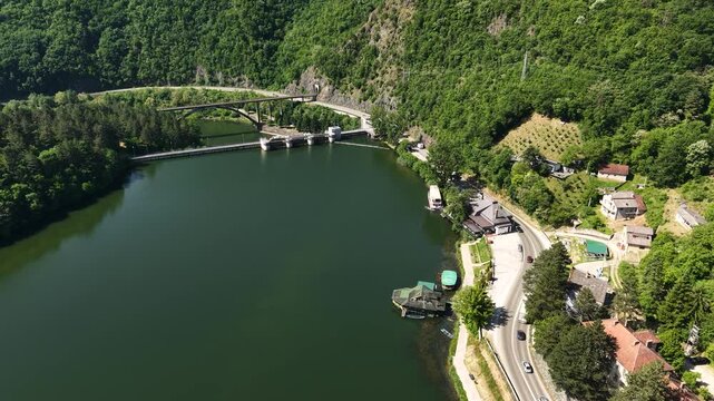 Drone Shot of Hydroelectric Power Plant Dam and Lake, Coastal Road and Landscape Near Cacak Serbia