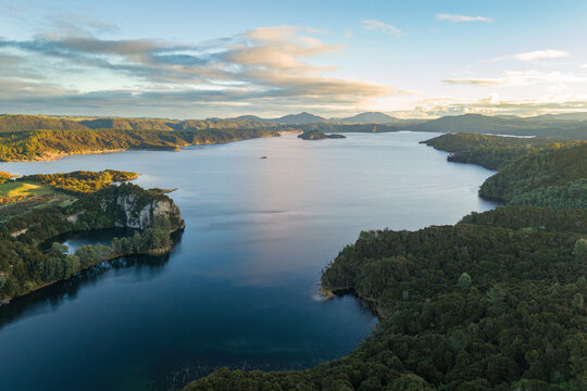 Aerial view of Lake Rotomahana, one of the many beautiful lakes in the Rotorua area of New Zealand, at sunset