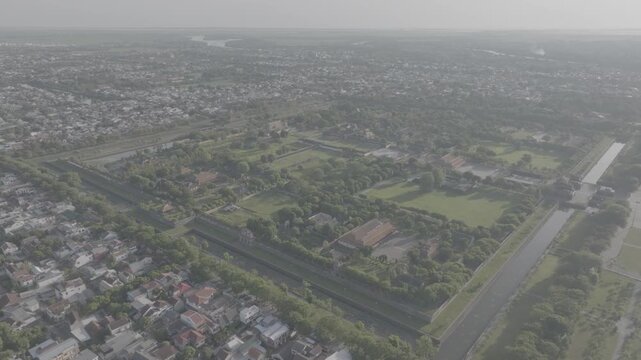 Aerial drone view of Hue Imperial Citadel featuring Ngo Mon Gate, Thai Hoa Palace and Kien Trung Palace, showcasing Vietnam's UNESCO royal heritage, ancient architecture and cultural landmark.