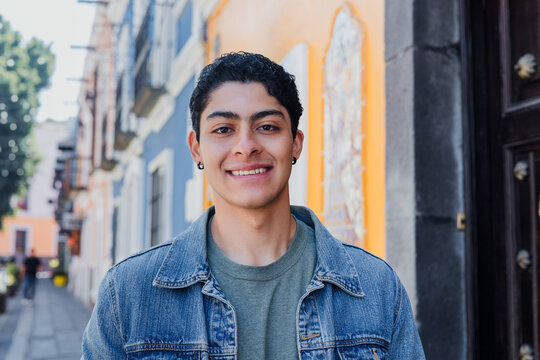 young latin man smiling outdoors in Mexico Latin America, hispanic and mexican male portrait