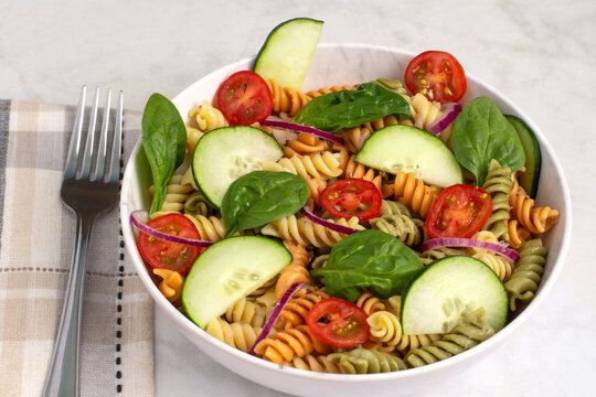 rotini garden salad  with red onions