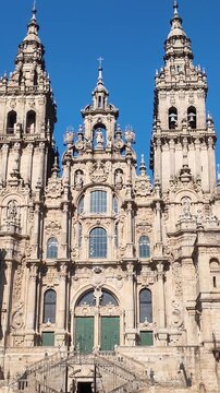 POV walking to Famous santiago de compostela cathedral in Majestic obradoiro sqaure, a catholic pilgrimage destination for the way of st. James