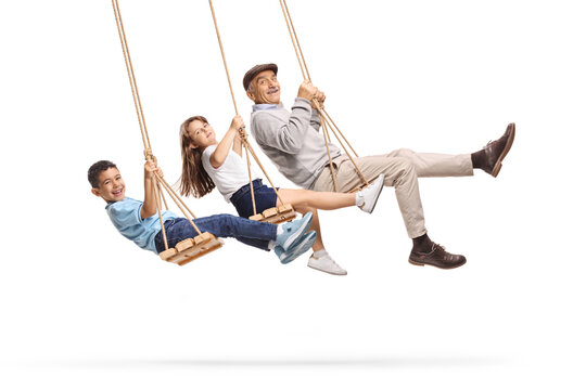Children with grandpa swinging on a swing