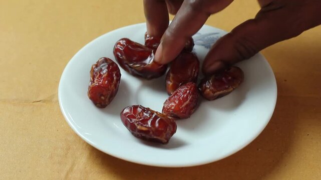 dried dates in a hand
