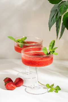 Refreshing strawberry daiquiri cocktails with mint for summer