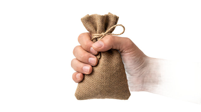 Human hand holding a small burlap sack tied with twine, isolated on a white background, for financial, savings, or mystery concepts