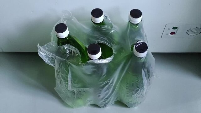 Pack of bottled drinking water on floor, emergency water supply, household water reserve and preparedness concept.