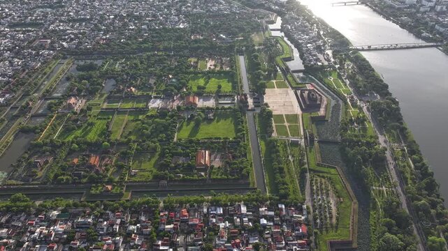 Aerial drone footage of the Imperial City of Hue, Vietnam, featuring Ngo Mon Gate, Thai Hoa Palace, and Kien Trung Palace. A UNESCO World Heritage Site - D log mode
