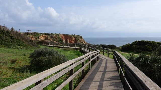 View of Ponta da Piedade Coastline in Lagos, Algarve, Portugal with Golden Cliffs and Atlantic Ocean