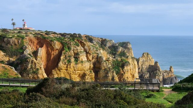 View of Ponta da Piedade Coastline in Lagos, Algarve, Portugal with Golden Cliffs and Atlantic Ocean