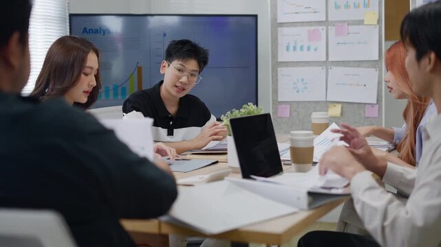 Investment Consultant,strategy,planning,Financial advisor and accounting concept.Group of business adviser meeting to analyze and discuss the situation on the financial report workplace office.