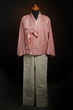 Korean Traditional Male Hanbok consist Upper Garment called Jeogori with White Pant on display mannequin
