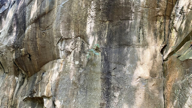 Close up texture of rugged natural stone cliff