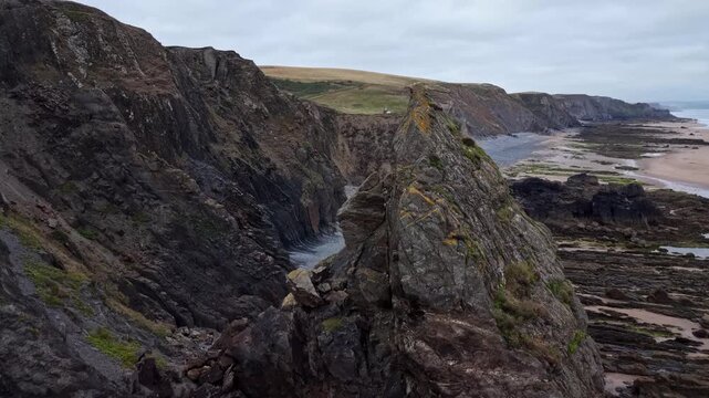 tight fly through cliffs at Sandymouth Bay Cornwall