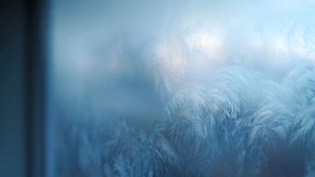 Frosted Window with Delicate Ice Crystal Patterns.