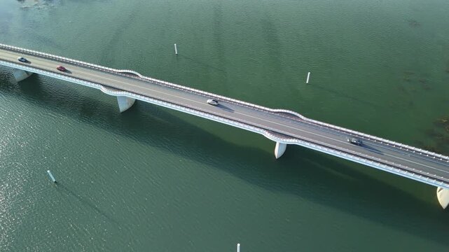 Aerial Drone View of the Sa&ocirc;ne River Bridge in France with Car Crossing