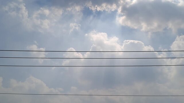 This cloudy phenomenon, which makes sunlight appear to flicker or dim, as if a light bulb is about to go out, is scientifically known as the natural stroboscopic effect. 