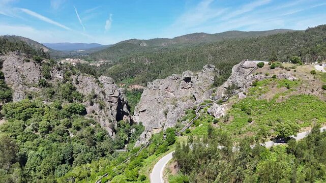 Side Drone Flight Along a Canyon Toward a Viewpoint in Portugal