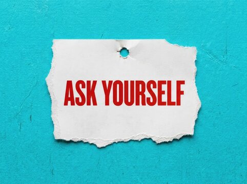 Ask Yourself, reminder note on torn paper with red text, encouraging self-reflection and introspection.
