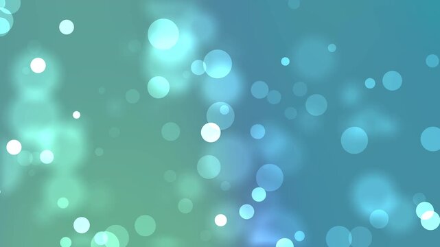 Soft teal bokeh particles drifting across a calm blue background