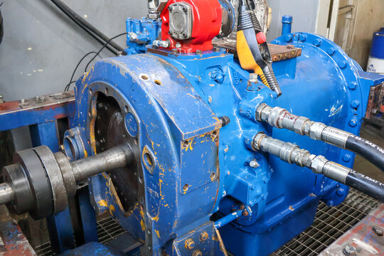 Blue Industrial Machinery and Transmission Assembly.