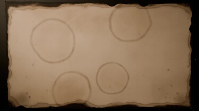 Appearing roll edge revealing sepia parchment in studio, rings forming then rerolling showing rod