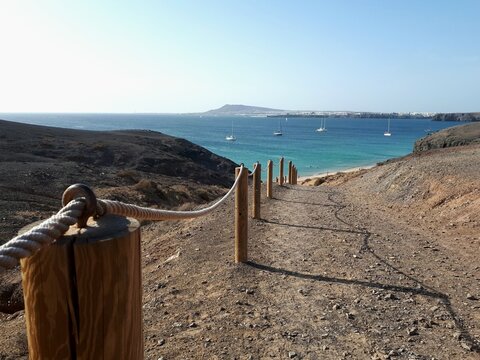 Wooden fence leading to Papagayo Beach, Lanzarote, Canary Islands, Spain