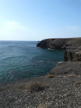 Volcanic cliffs above the Atlantic Ocean in Lanzarote, Canary Islands, Spain