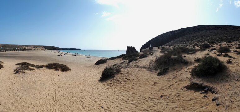 Panoramic view of Playa Mujeres with turquoise Atlantic Ocean, Lanzarote, Canary Islands, Spain