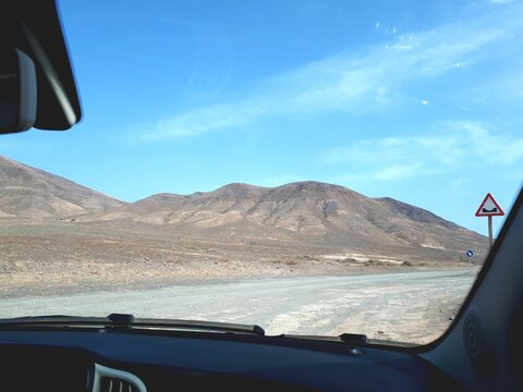 Driving through the volcanic landscape of Timanfaya National Park, Lanzarote, Canary Islands, Spain
