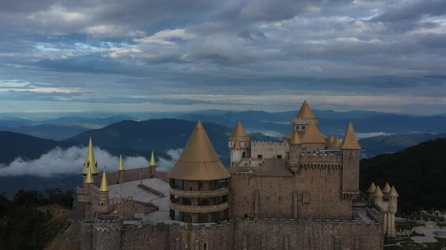 Cinematic Drone Footage of Ba Na Hills Featuring Golden Hands Bridge, Linh Ung Pagoda, Sun World French Village Castle and Mountain View Overlooking Da Nang