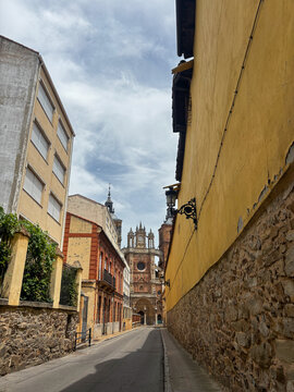 Charming street in the historic center of Astorga with a view of the Gothic Cathedral. Traditional Spanish architecture and popular travel destination in Leon