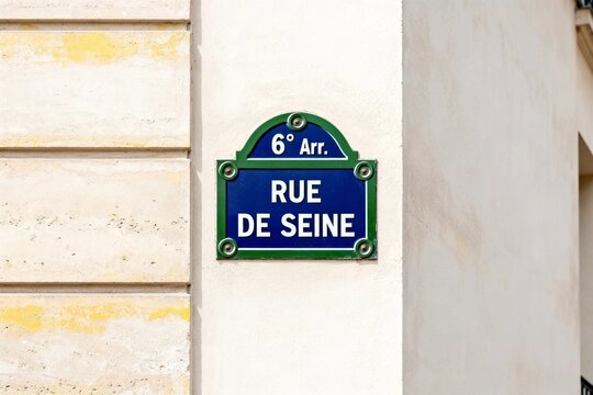 Paris Street Sign 'Rue de Seine' on Stone Wall