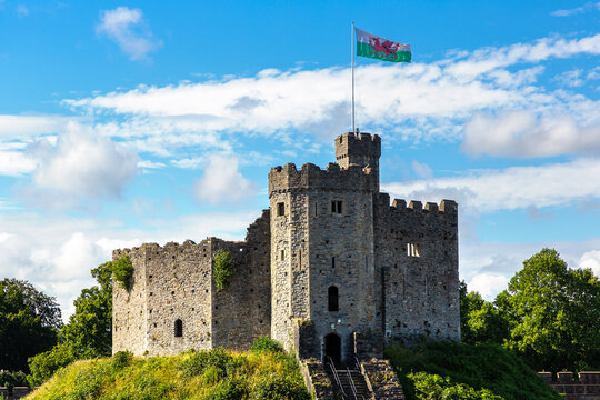 Cardiff Castle Norman Keep with Welsh Flag in Cardiff, Wales, UK