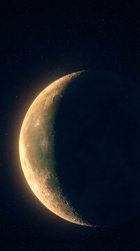 Crescent moon with visible craters in starry night sky