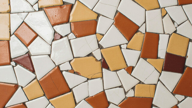Rustic mosaic tile celebrating authentic imperfection in earthy tones